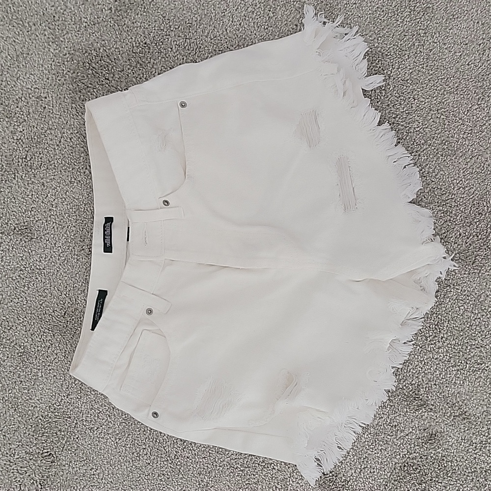 White denim distressed shorts